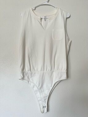 NWOT Cream Sleeveless One-Piece Bodysuit